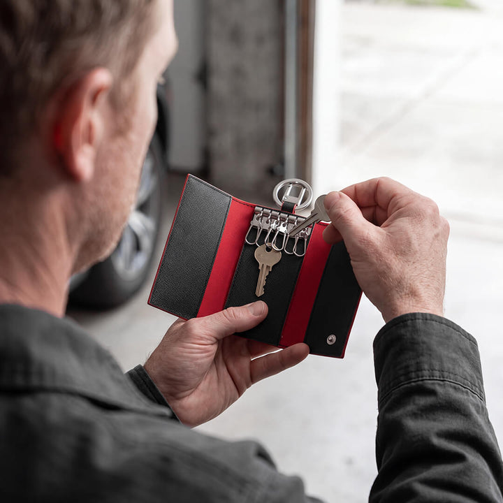 Maverick & Co. - Manhattan Leather Key Case - clipping a key onto a silver snap hook